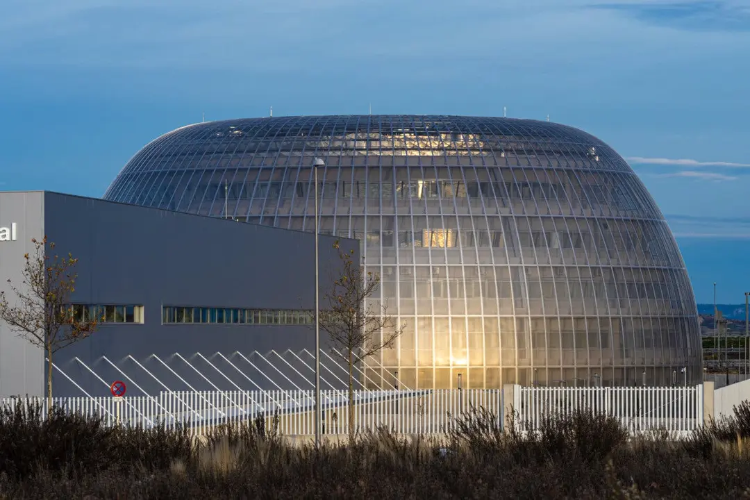 &laquo;Madrid, Spain &raquo;; December 27 2020: General exterior view of Enfermera Isabel Zendal hospital, &ldquo;Pandemic&rdquo; Hospital coronavirus disease (COVID-19) and the Dome of the Institute of Legal Medicine