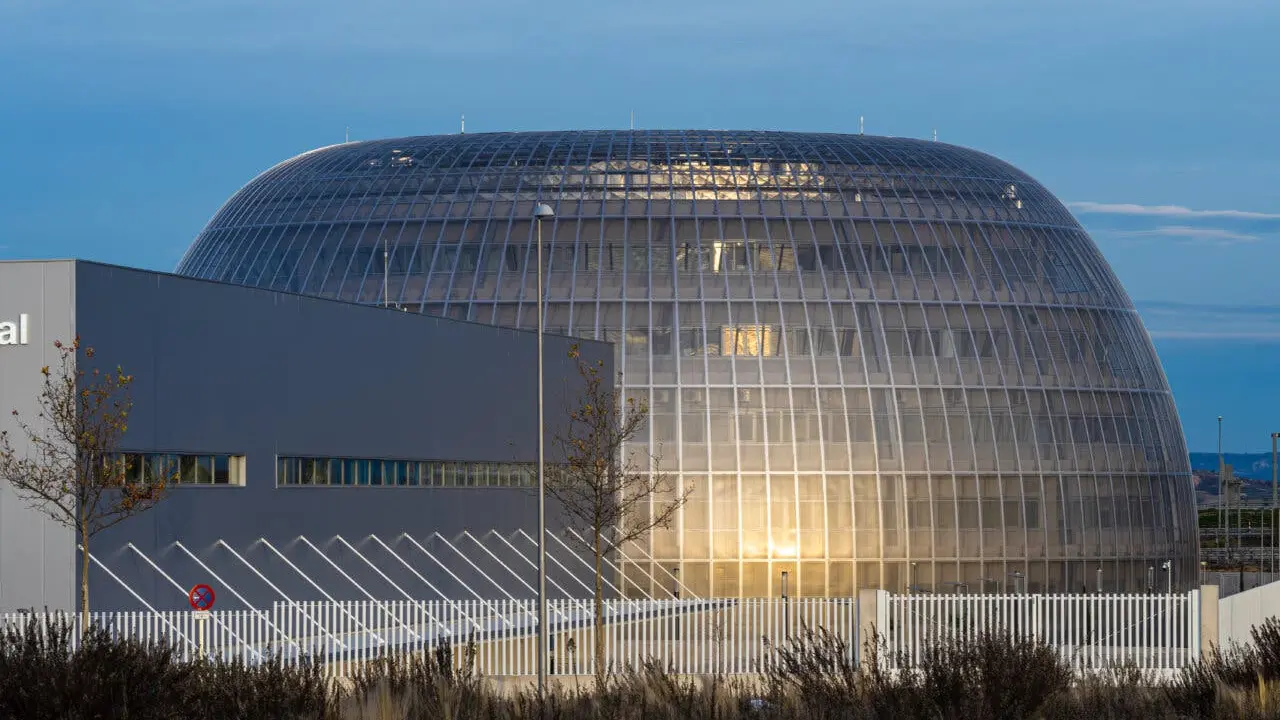 &laquo;Madrid, Spain &raquo;; December 27 2020: General exterior view of Enfermera Isabel Zendal hospital, &ldquo;Pandemic&rdquo; Hospital coronavirus disease (COVID-19) and the Dome of the Institute of Legal Medicine