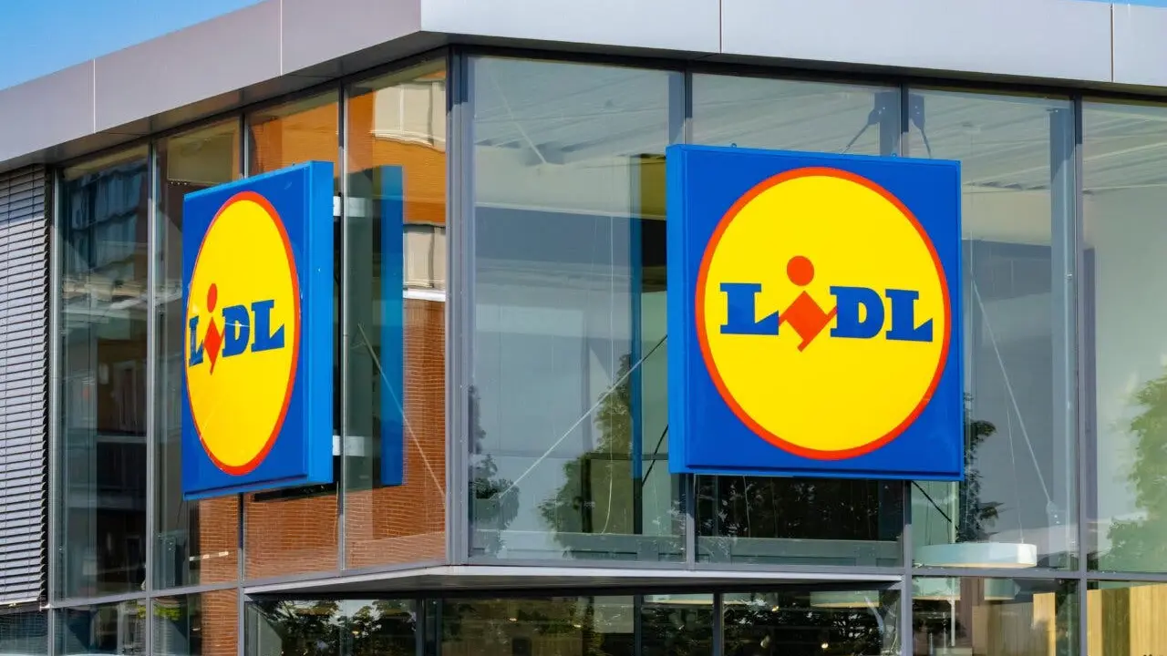 Wolvega, Netherlands, 06-27-2024, Main facade of Lidl supermarket with blue, yellow and red logo, sign, Lidl is a German international discount retailer chain with 12.000 stores worldwide