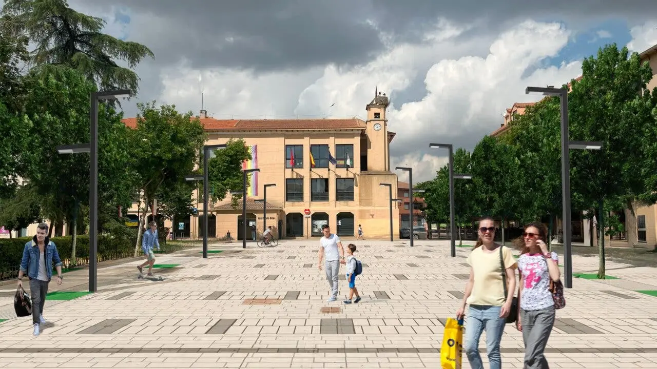 Una animada plaza con varias personas disfrutando del espacio p&uacute;blico.