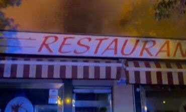 Una mujer herida y 30 viviendas desalojadas por un incendio en un bar de Villaverde
