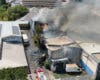 Un incendio arrasa una nave de paquetería en Getafe