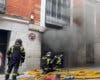 Gran humareda en el centro de Madrid por un incendio en un garaje con dos coches afectados